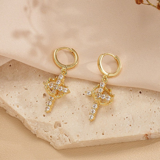 Crown cross huggie earrings, gold tone