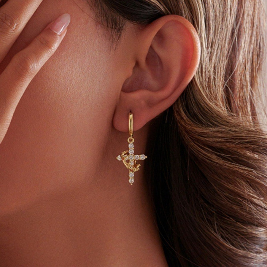 Moissanite cross necklace on a velvet box