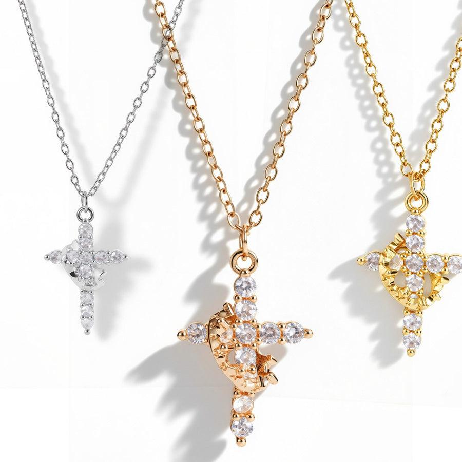Moissanite cross necklace on a velvet box